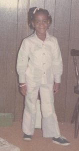 Childhood photo of Lana Reid, reflecting early confidence and self-expression